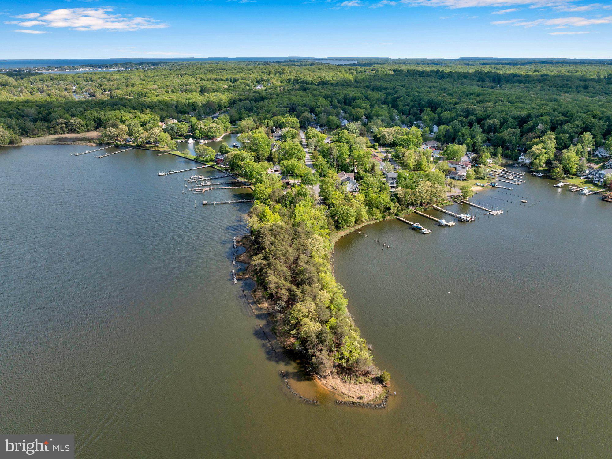 505 Brewerton Lane Edgewater, MD 21037 - Photo 64 of 78 a view of a lake with a mountain in the background