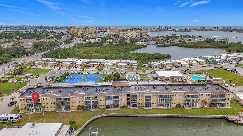1 Boca Ciega Point Boulevard, Unit 215 St. Petersburg, FL 33708 - Photo 38 of 39 a view of a lake with building in front of it
