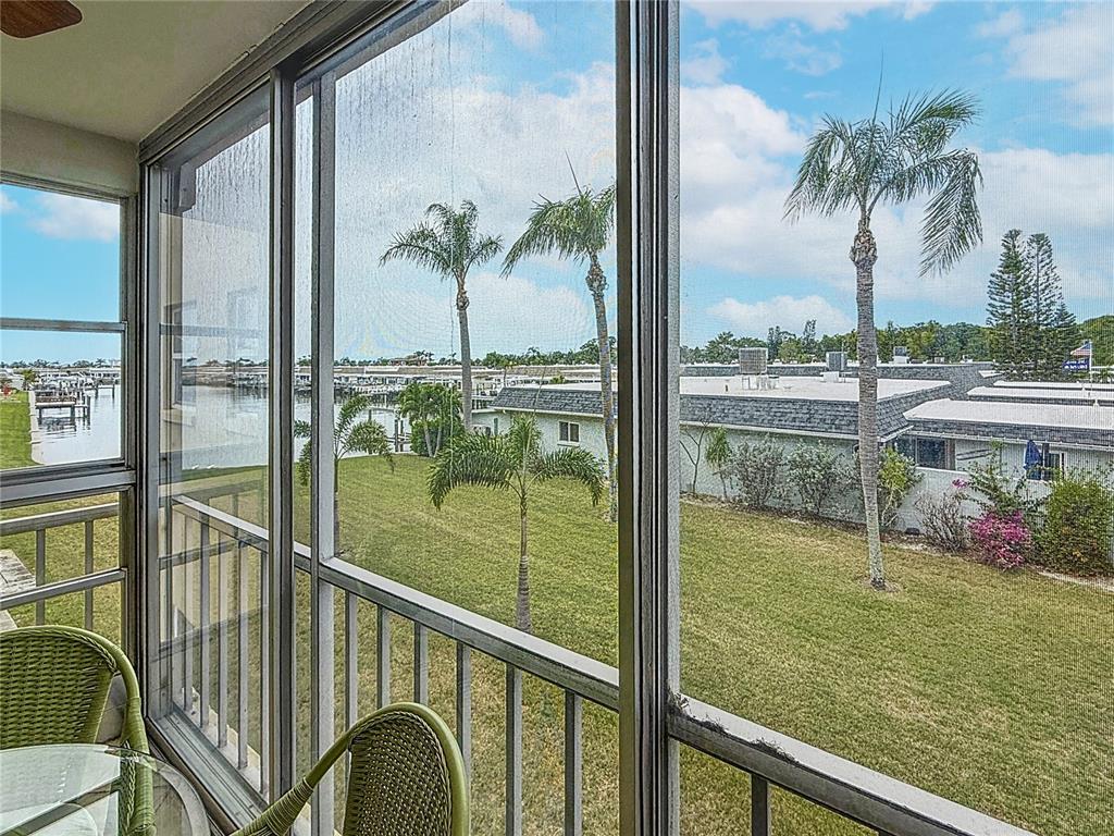 1 Boca Ciega Point Boulevard, Unit 215 St. Petersburg, FL 33708 - Photo 4 of 39 a view of a balcony with lake view and a ocean view