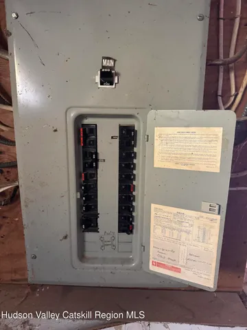 a view of a living room with a large window