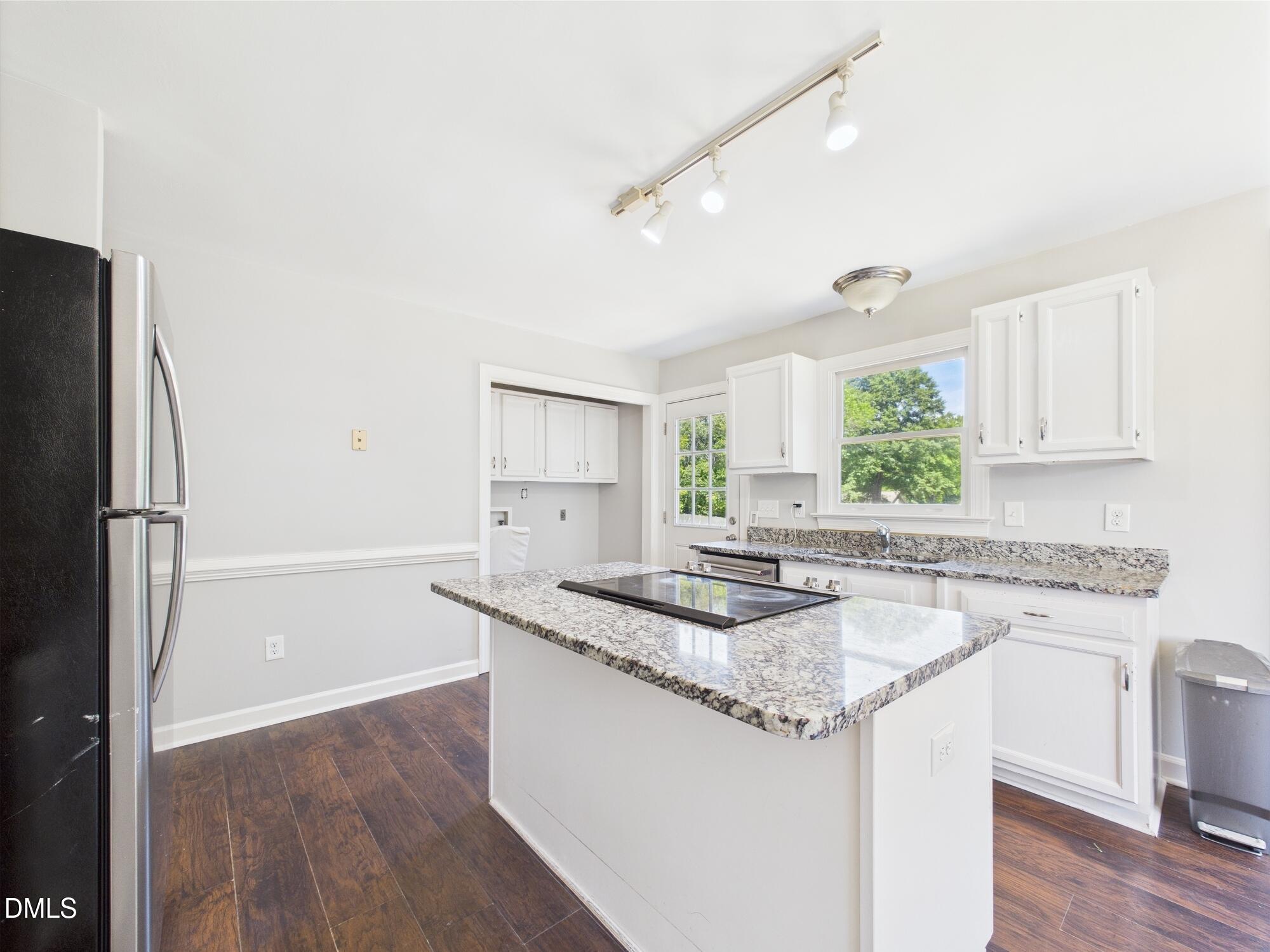10917 Fanny Brown Road Raleigh, NC 27603 - Photo 22 of 54 a kitchen with stainless steel appliances granite countertop a sink stove and refrigerator