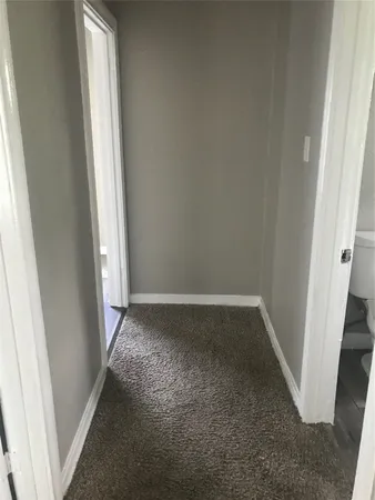 a view of a back yard of the house