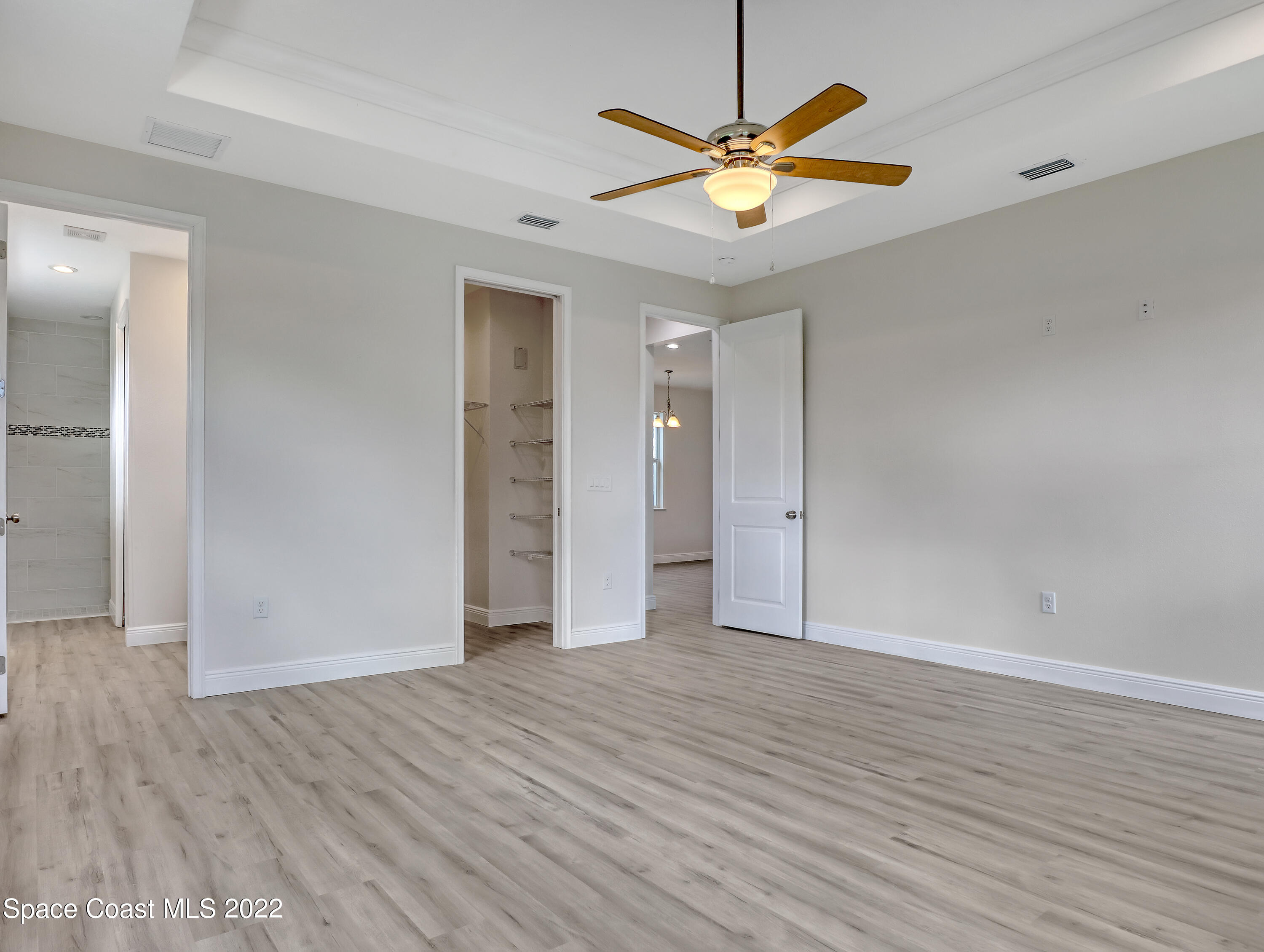 585 Degroodt Road Southwest Palm Bay, FL 32908 - Photo 20 of 40 Master Bedroom