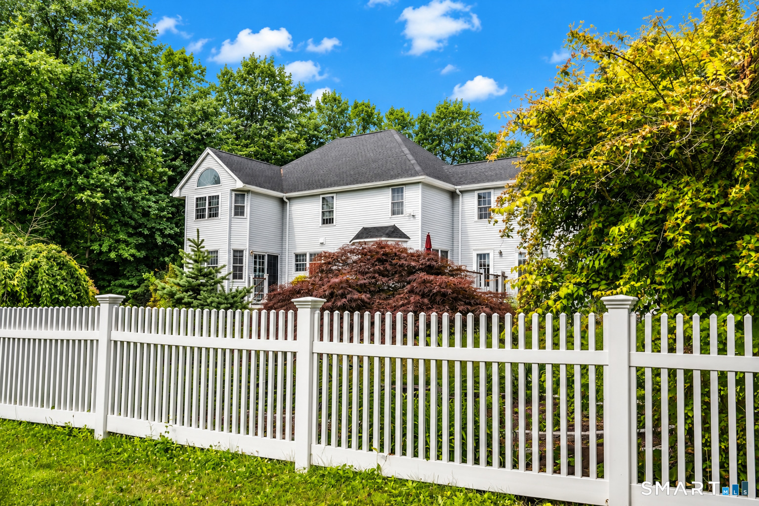 35 Anderson Lane Durham, CT 06422 - Photo 23 of 25 Enjoy outdoor living on the spacious Trex deck surrounded by established landscaping and lush lawn