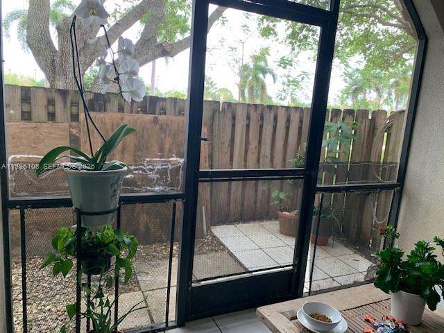 513 Racquet Club Road, Unit 55 Weston, FL 33326 - Photo 16 of 25 a view of balcony with a potted plant