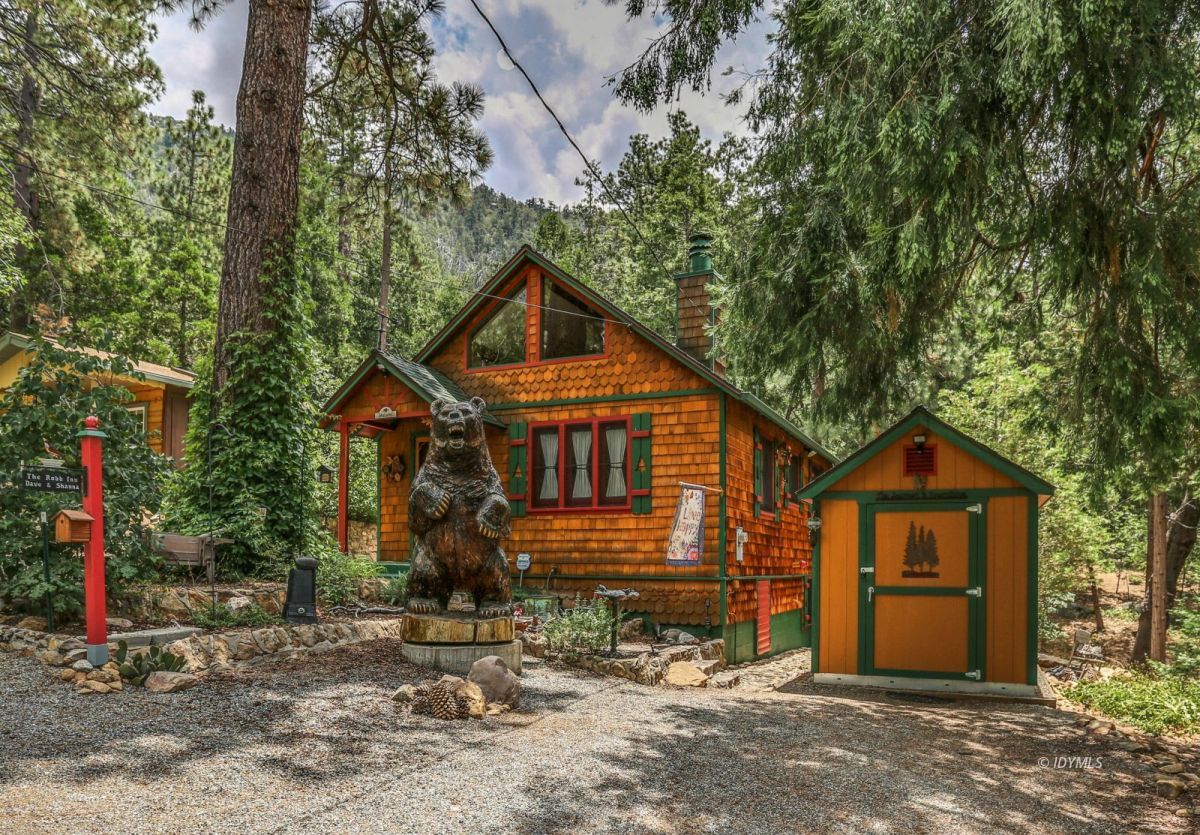55255 Daryll Road Idyllwild, CA 92549 - Photo 2 of 41 a front view of a house with garden