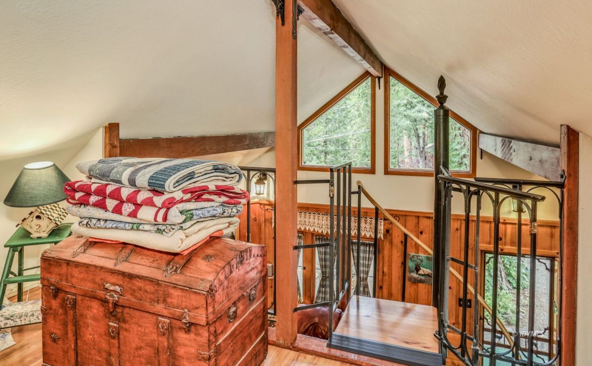 55255 Daryll Road Idyllwild, CA 92549 - Photo 23 of 41 a bed room with a bed and a window