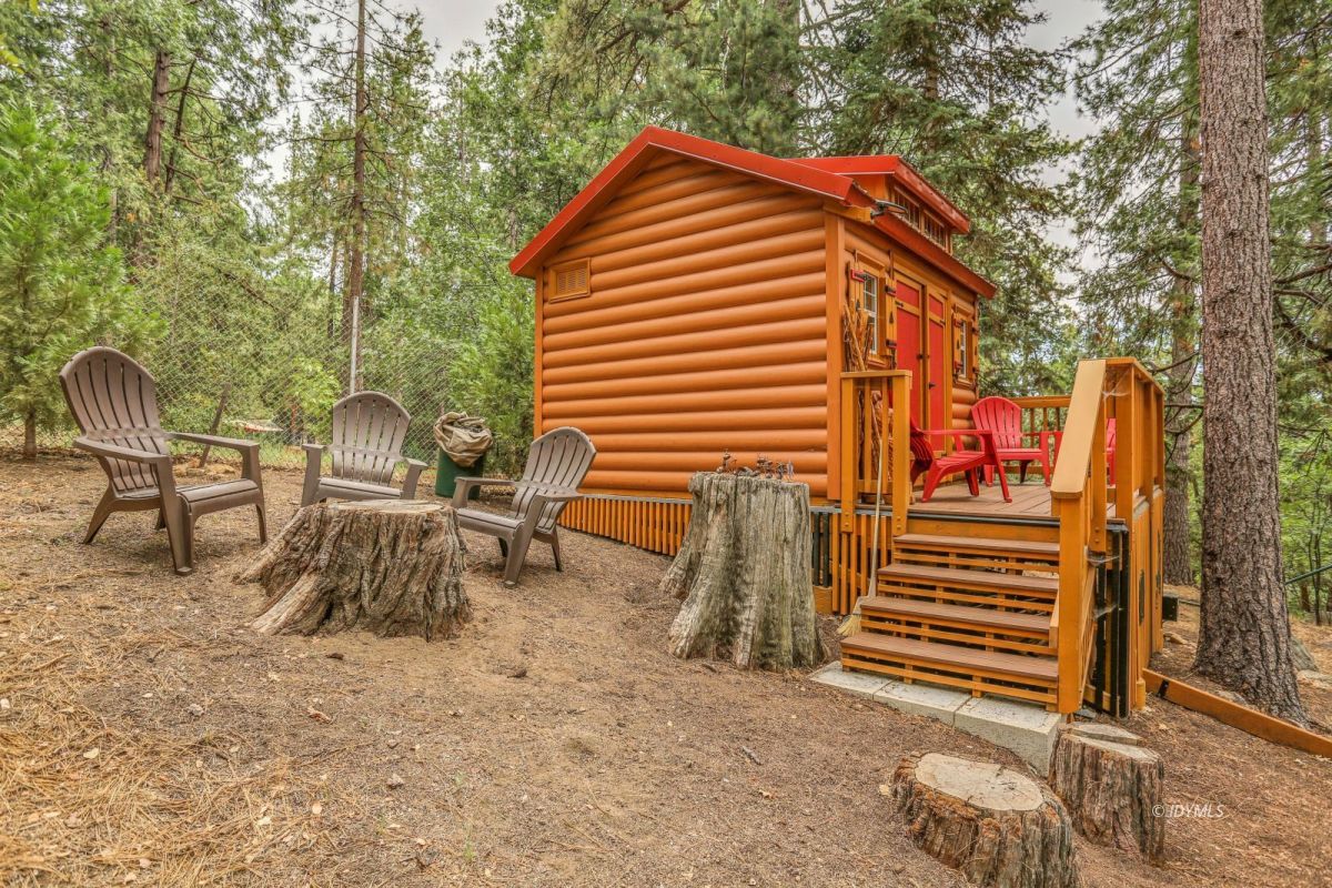 55255 Daryll Road Idyllwild, CA 92549 - Photo 34 of 41 a backyard of a house with table and chairs
