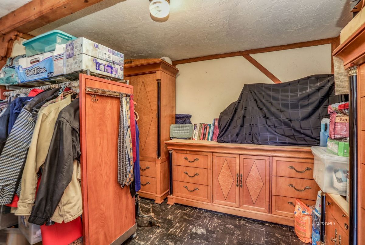 55255 Daryll Road Idyllwild, CA 92549 - Photo 40 of 41 a view of walk in closet with clothes and shoes