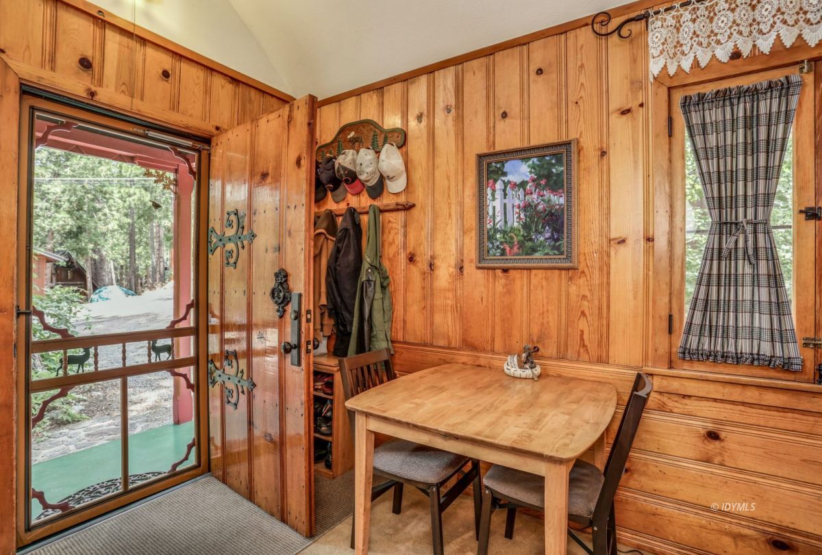 55255 Daryll Road Idyllwild, CA 92549 - Photo 6 of 41 a view of a dining room with furniture and window
