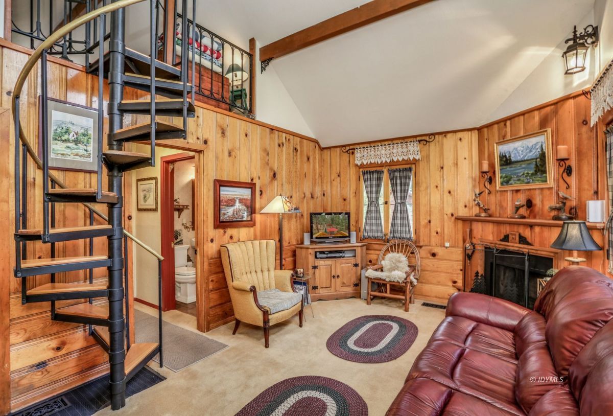 55255 Daryll Road Idyllwild, CA 92549 - Photo 8 of 41 a living room with furniture a rug and white walls
