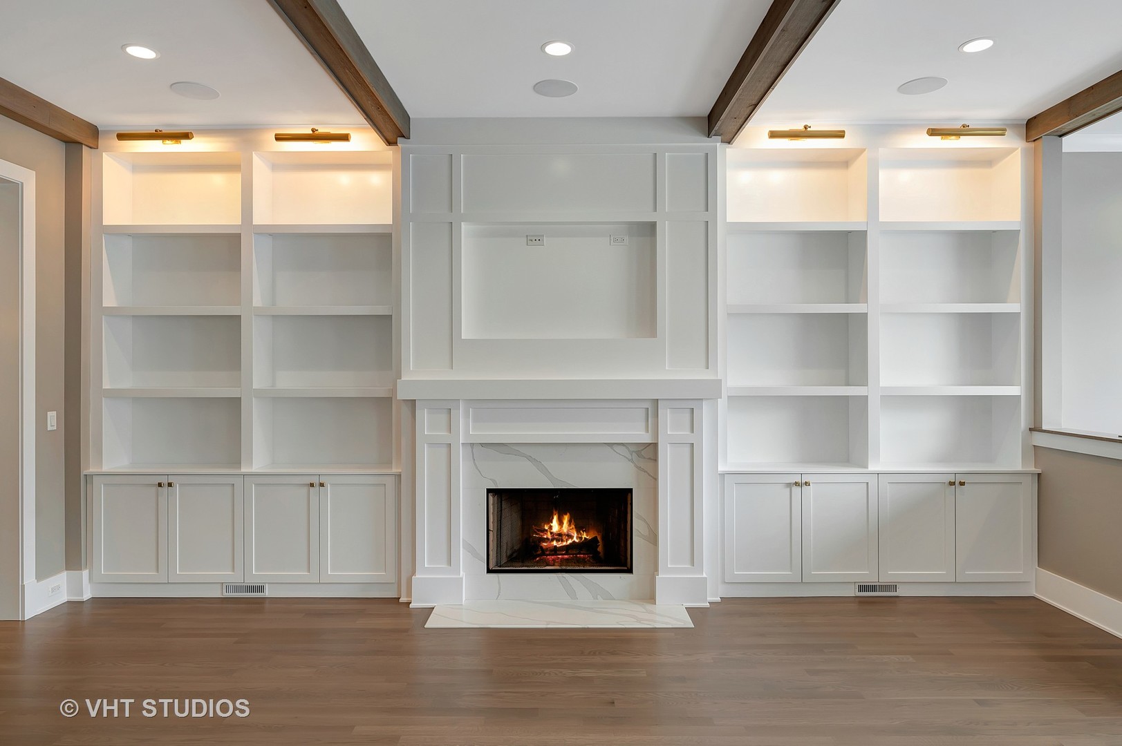 3712 North Marshfield Avenue Chicago, IL 60613 - Photo 2 of 21 a living room with a fireplace cabinet and a large window