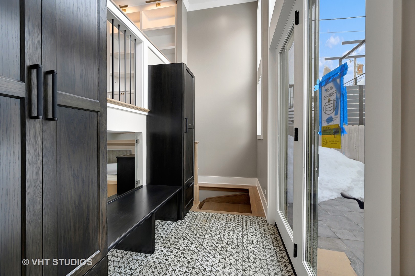 3712 North Marshfield Avenue Chicago, IL 60613 - Photo 21 of 21 a view of a hallway with wooden floor and glass door