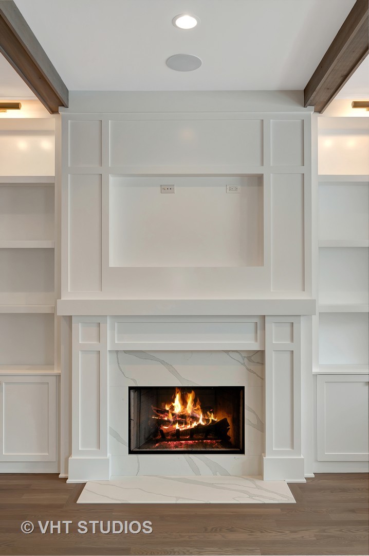 3712 North Marshfield Avenue Chicago, IL 60613 - Photo 3 of 21 a living room with a fireplace