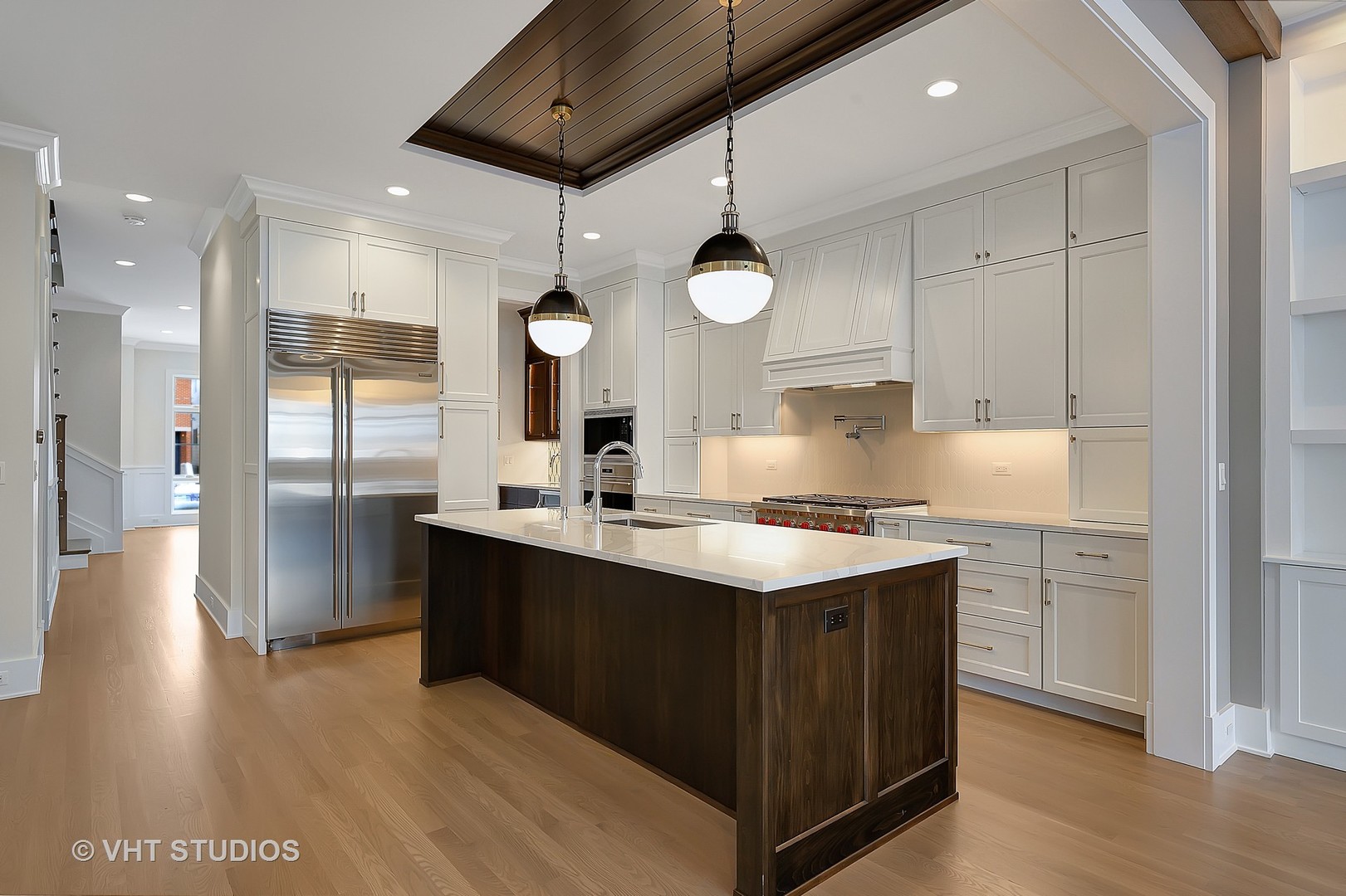 3712 North Marshfield Avenue Chicago, IL 60613 - Photo 4 of 21 a kitchen with stainless steel appliances granite countertop a sink stove and refrigerator