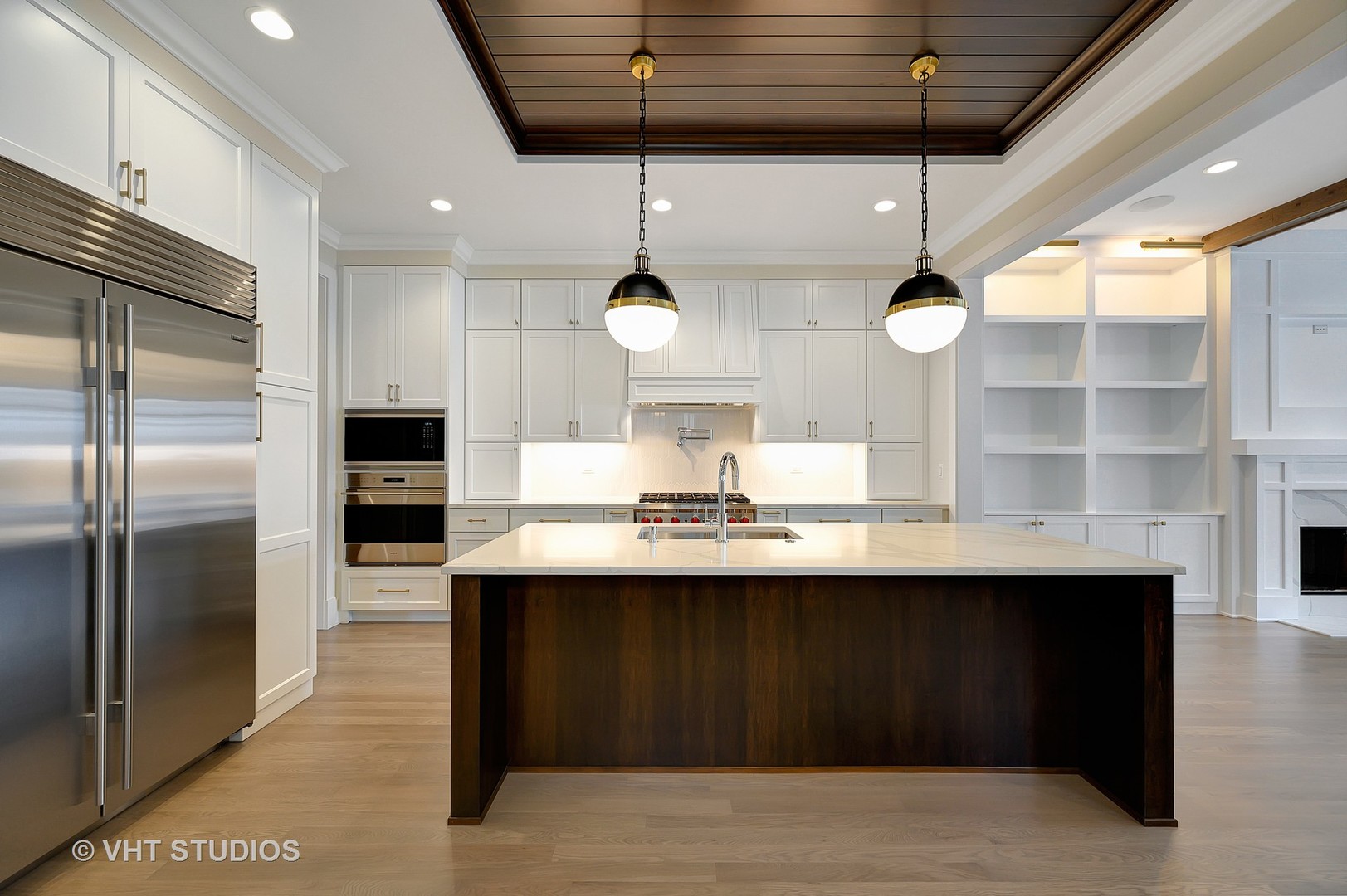 3712 North Marshfield Avenue Chicago, IL 60613 - Photo 5 of 21 a kitchen with stainless steel appliances a sink a counter space cabinets and wooden floor