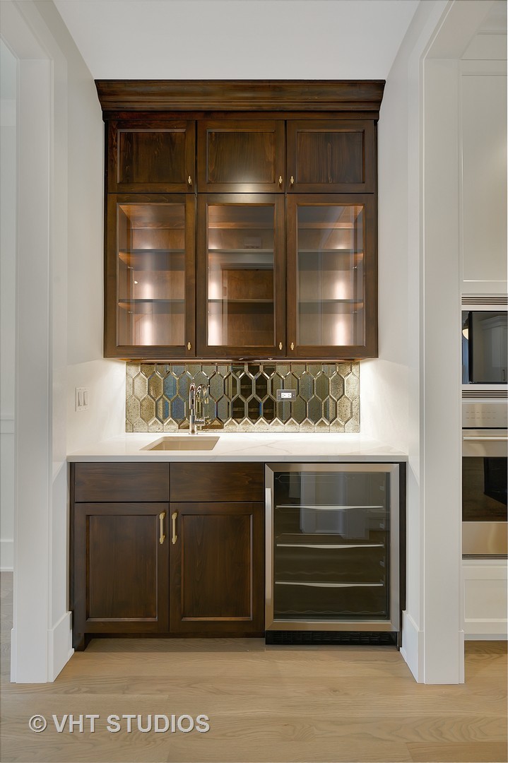 3712 North Marshfield Avenue Chicago, IL 60613 - Photo 9 of 21 a bathroom with a sink and a mirror