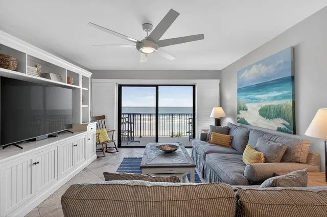 a view of a balcony with wooden floor