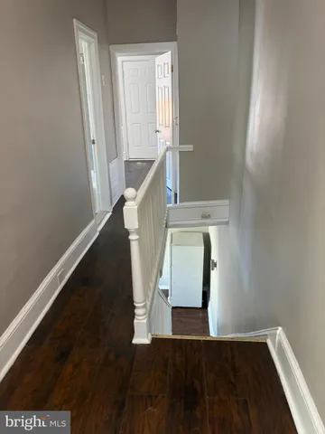 a view of entryway with wooden floor