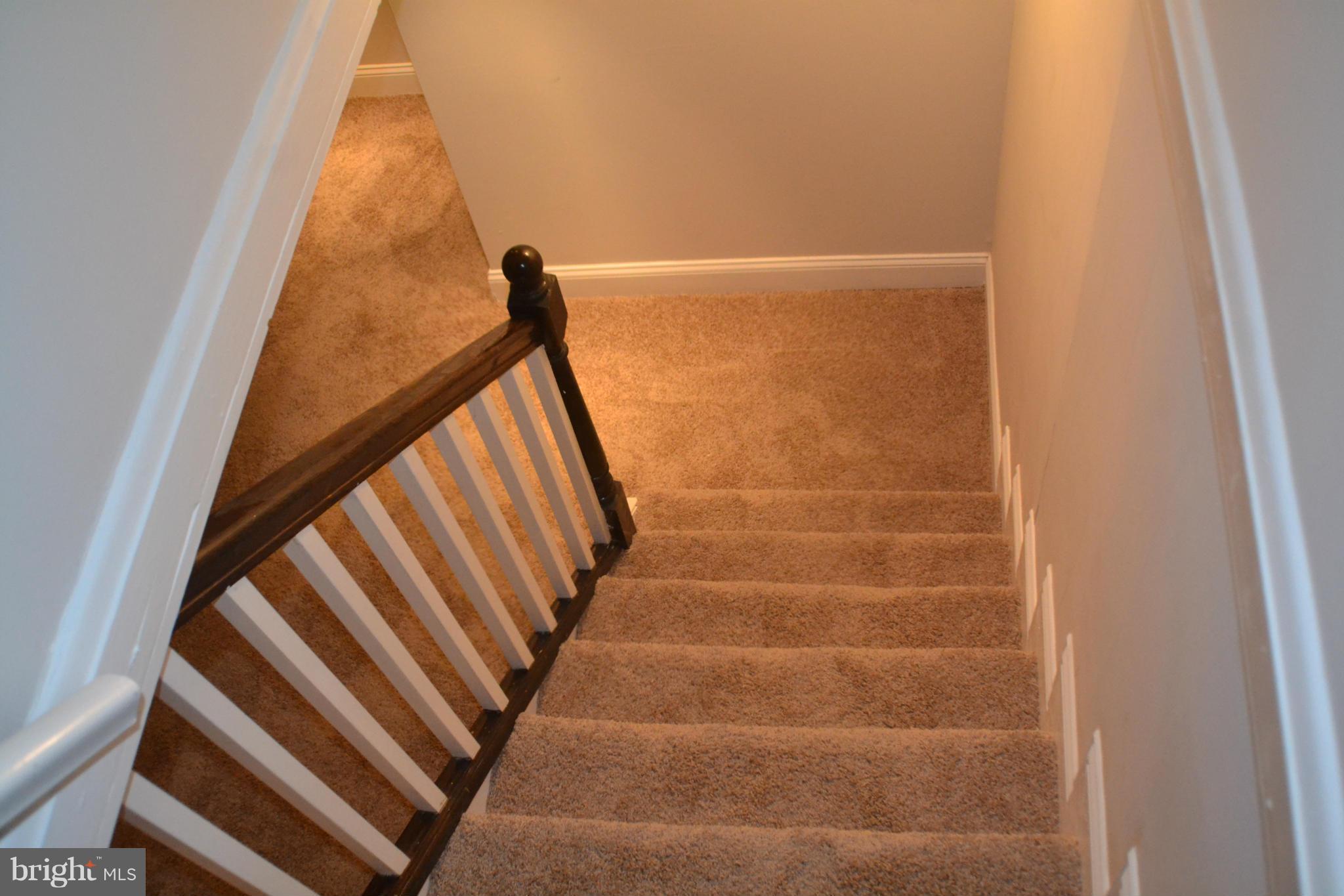 1424 Cedarcroft Road Baltimore, MD 21239 - Photo 6 of 16 a view of stairs