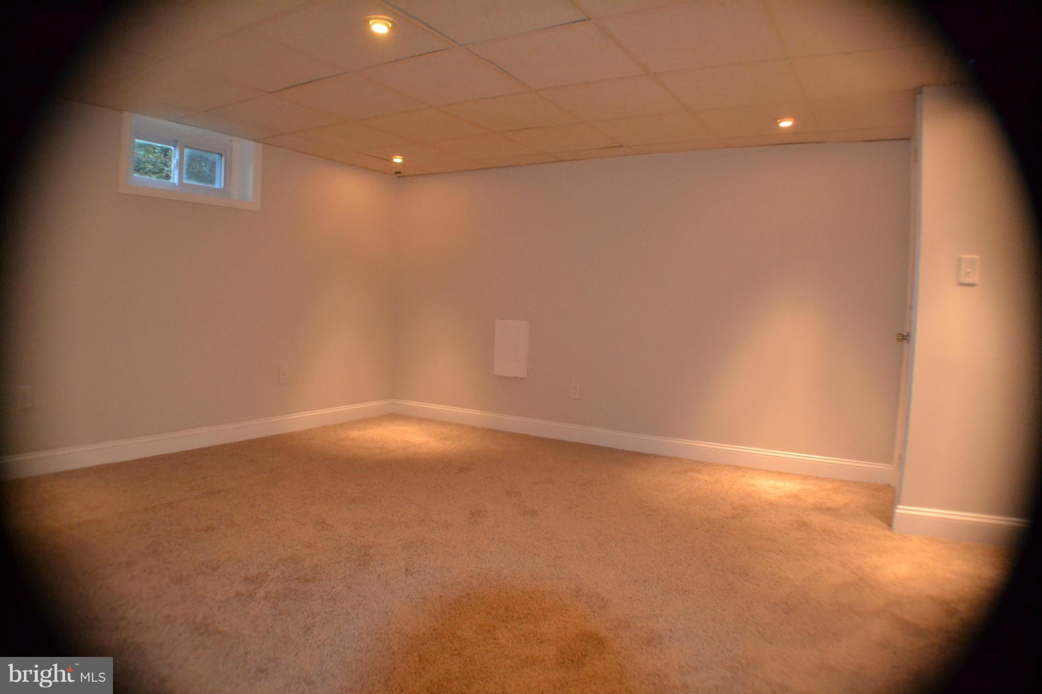 1424 Cedarcroft Road Baltimore, MD 21239 - Photo 7 of 16 a view of an empty room