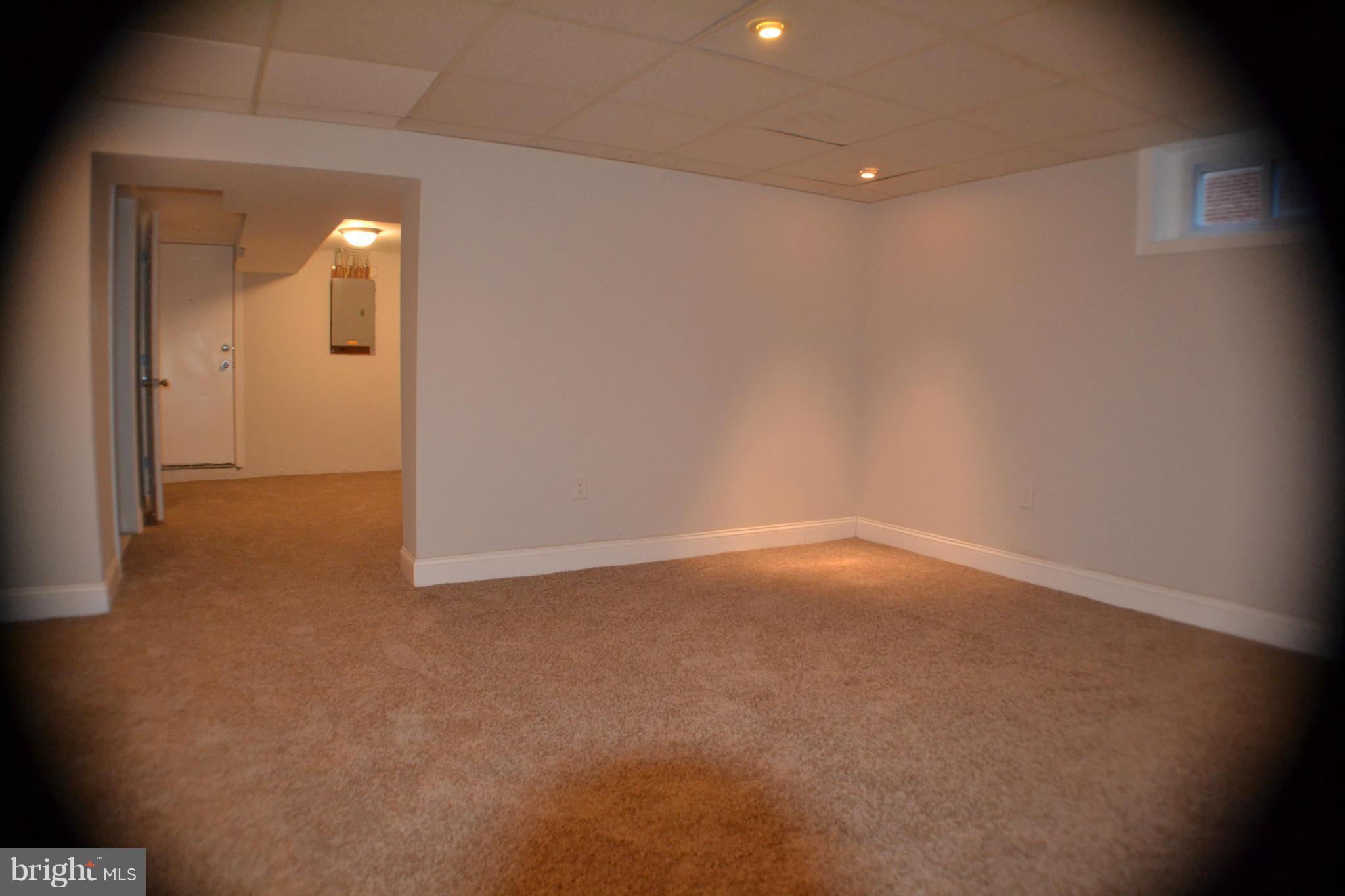 1424 Cedarcroft Road Baltimore, MD 21239 - Photo 8 of 16 a view of empty room