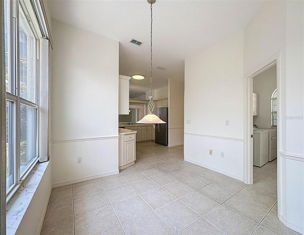 9237 Penelope Drive Weeki Wachee, FL 34613 - Photo 5 of 19 a view of a room with storage and utility