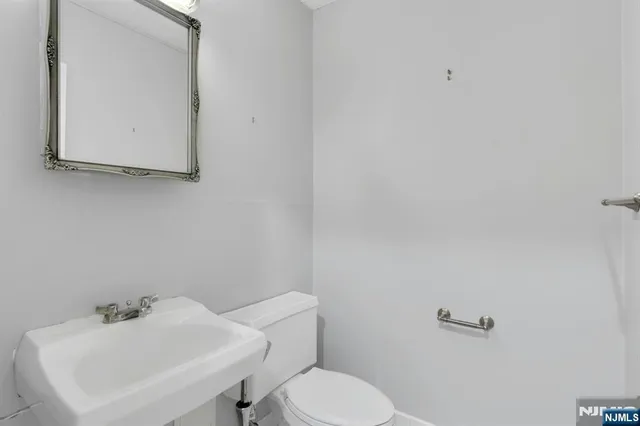 a bathroom with a sink and a toilet
