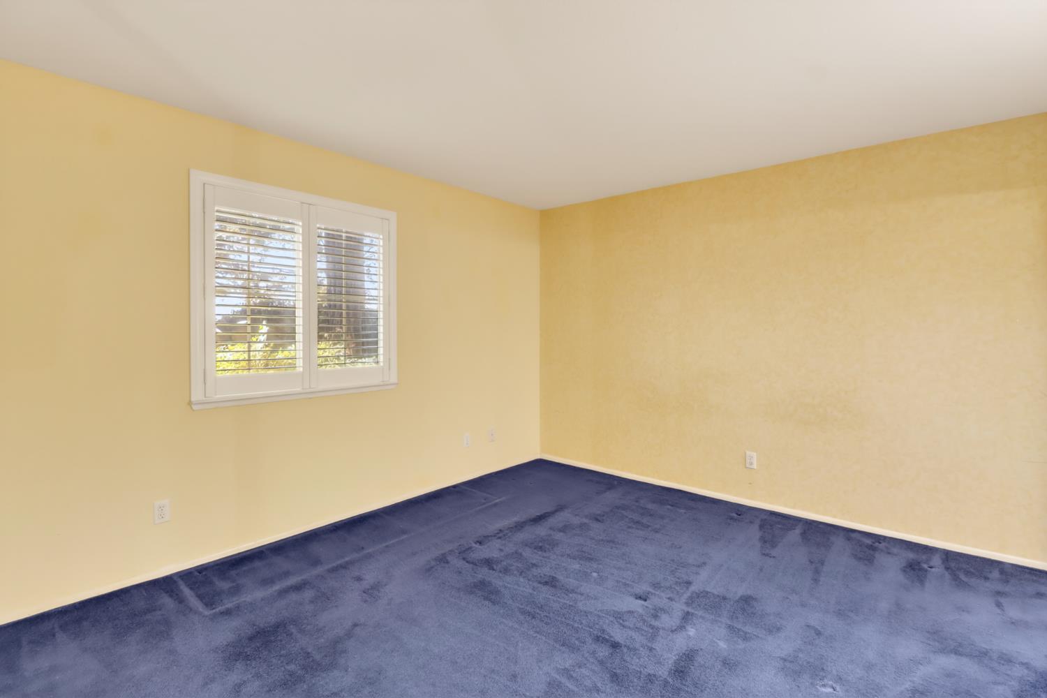 8020 Walerga Road, Unit 1009 Antelope, CA 95843 - Photo 18 of 39 Primary bedroom with shutters