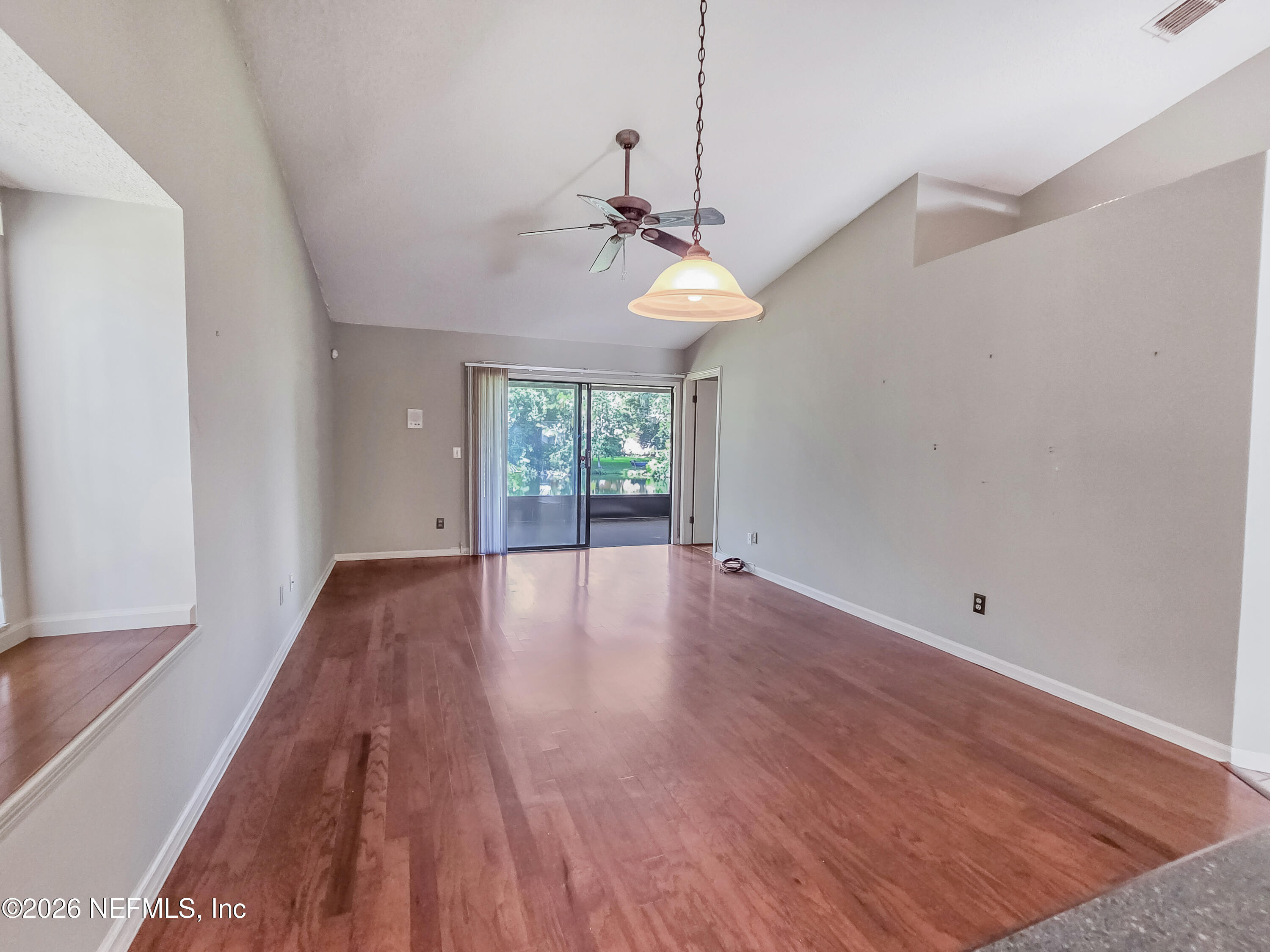 8715 Belle Rive Boulevard, Unit 1501 Jacksonville, FL 32256 - Photo 5 of 23 Dining/Living Room