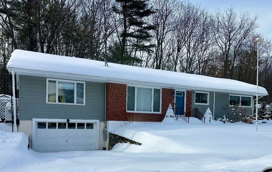 35 Princeton Street Gardner, MA 01440 - Photo 16 of 23 a view of a white house with large windows and a table and chairs