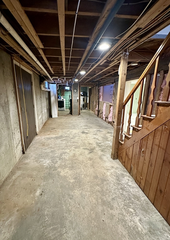 35 Princeton Street Gardner, MA 01440 - Photo 17 of 23 a view of an empty room with wooden stairs