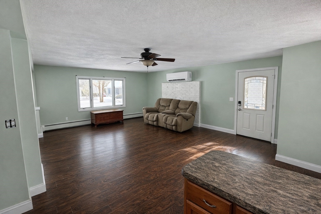 35 Princeton Street Gardner, MA 01440 - Photo 3 of 23 a living room with furniture and a wooden floor