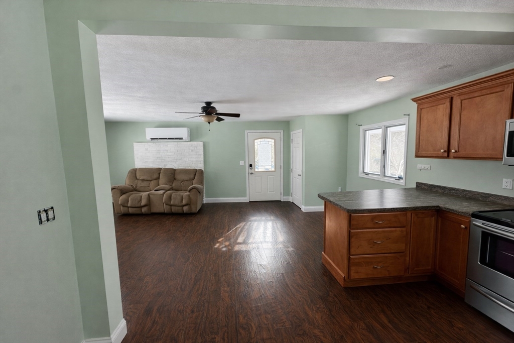 35 Princeton Street Gardner, MA 01440 - Photo 4 of 23 a kitchen with furniture and wooden floor