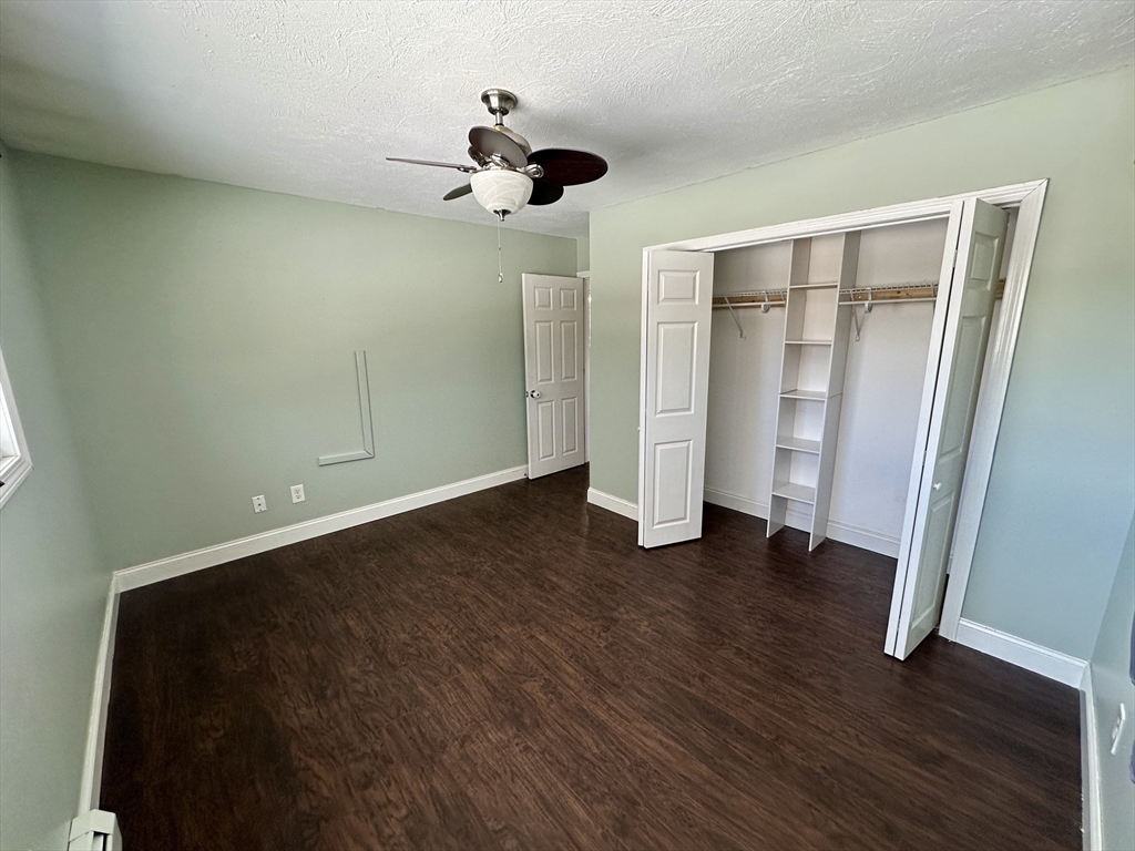 35 Princeton Street Gardner, MA 01440 - Photo 10 of 23 wooden floor in an empty room with a window