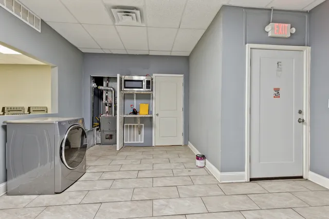 a view of a storage & utility room with washer and dryer