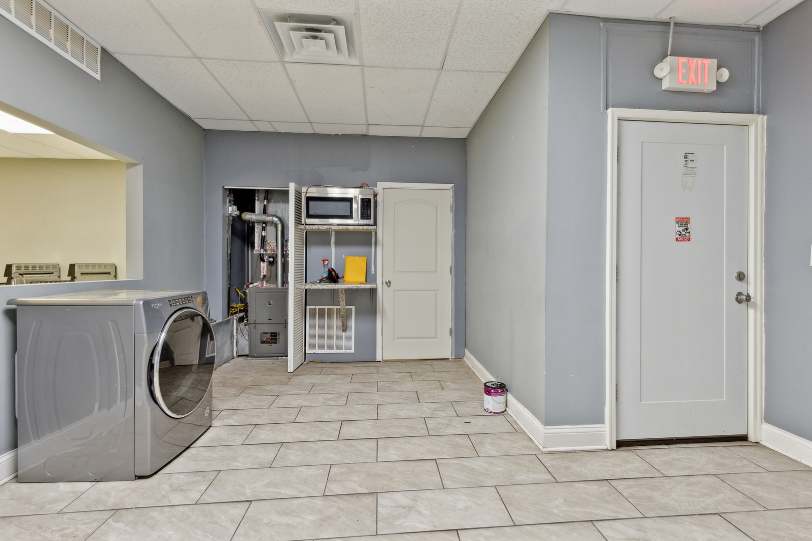 2913 West 63rd Street Chicago, IL 60629 - Photo 6 of 20 a view of a storage & utility room with washer and dryer
