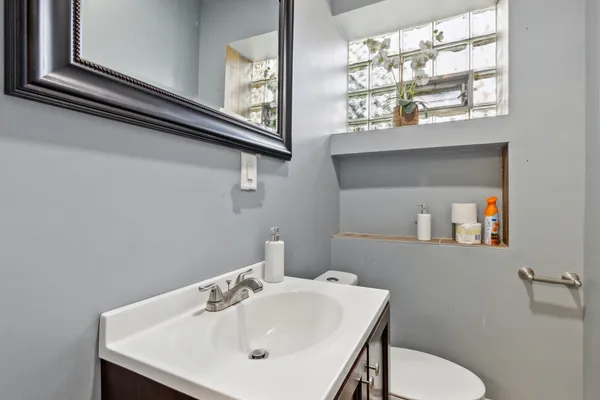 a bathroom with a sink and a toilet