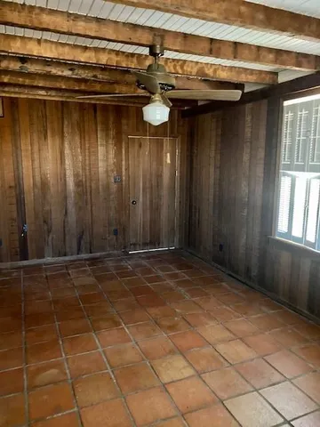 a kitchen with a stove and a sink