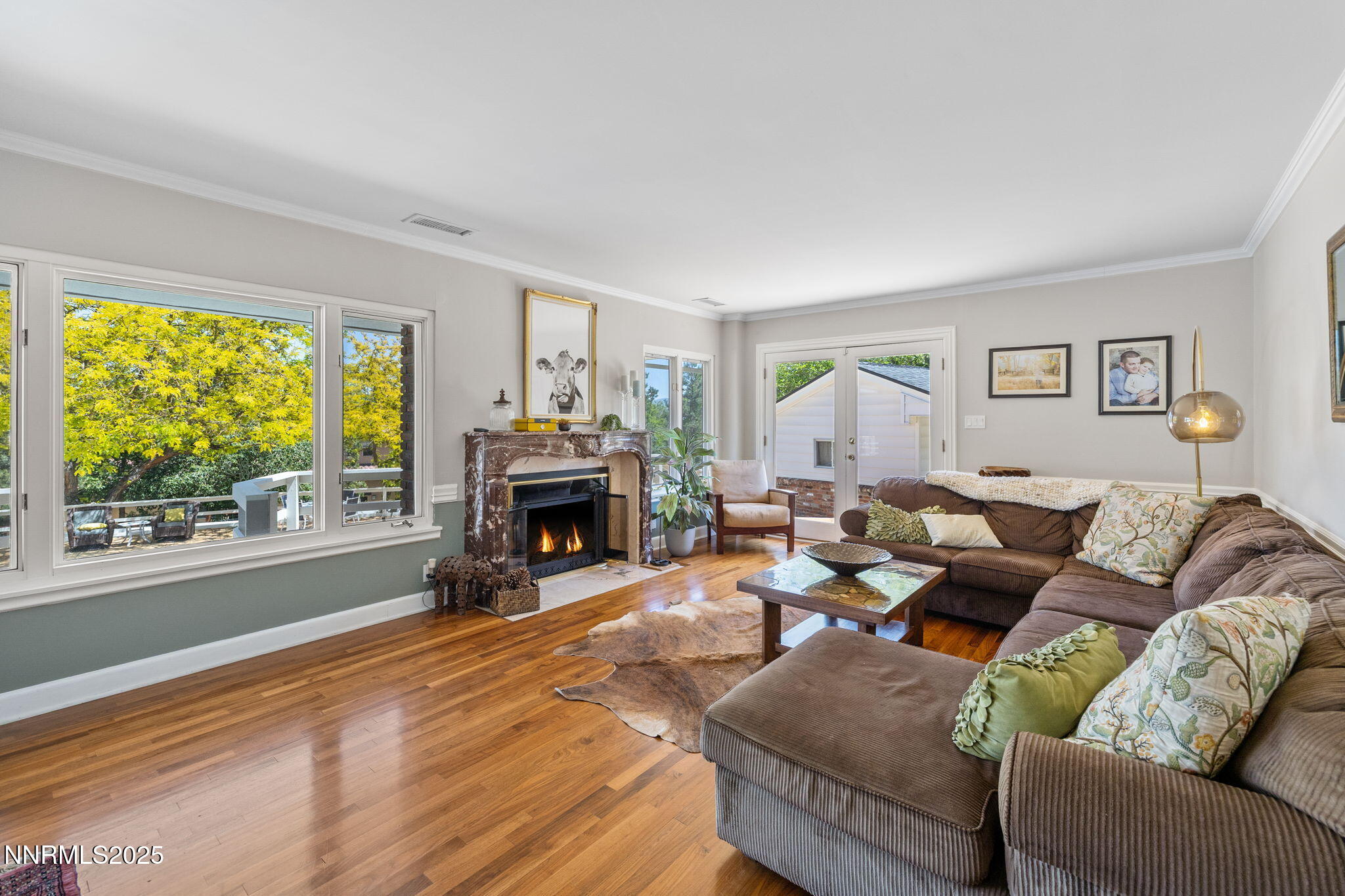 1855 Sierra Sage Lane Reno, NV 89509 - Photo 12 of 34 a living room with furniture and a fireplace