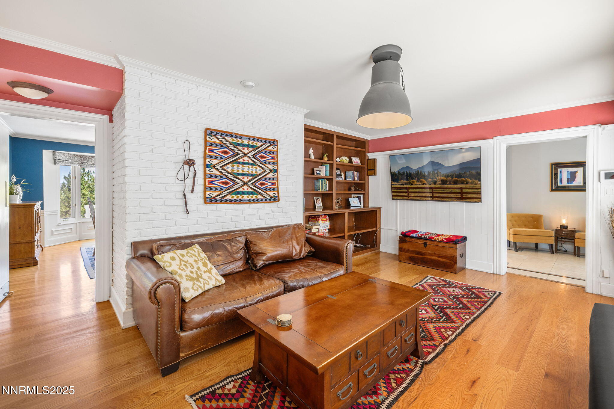 1855 Sierra Sage Lane Reno, NV 89509 - Photo 16 of 34 a living room with furniture and a wooden floor