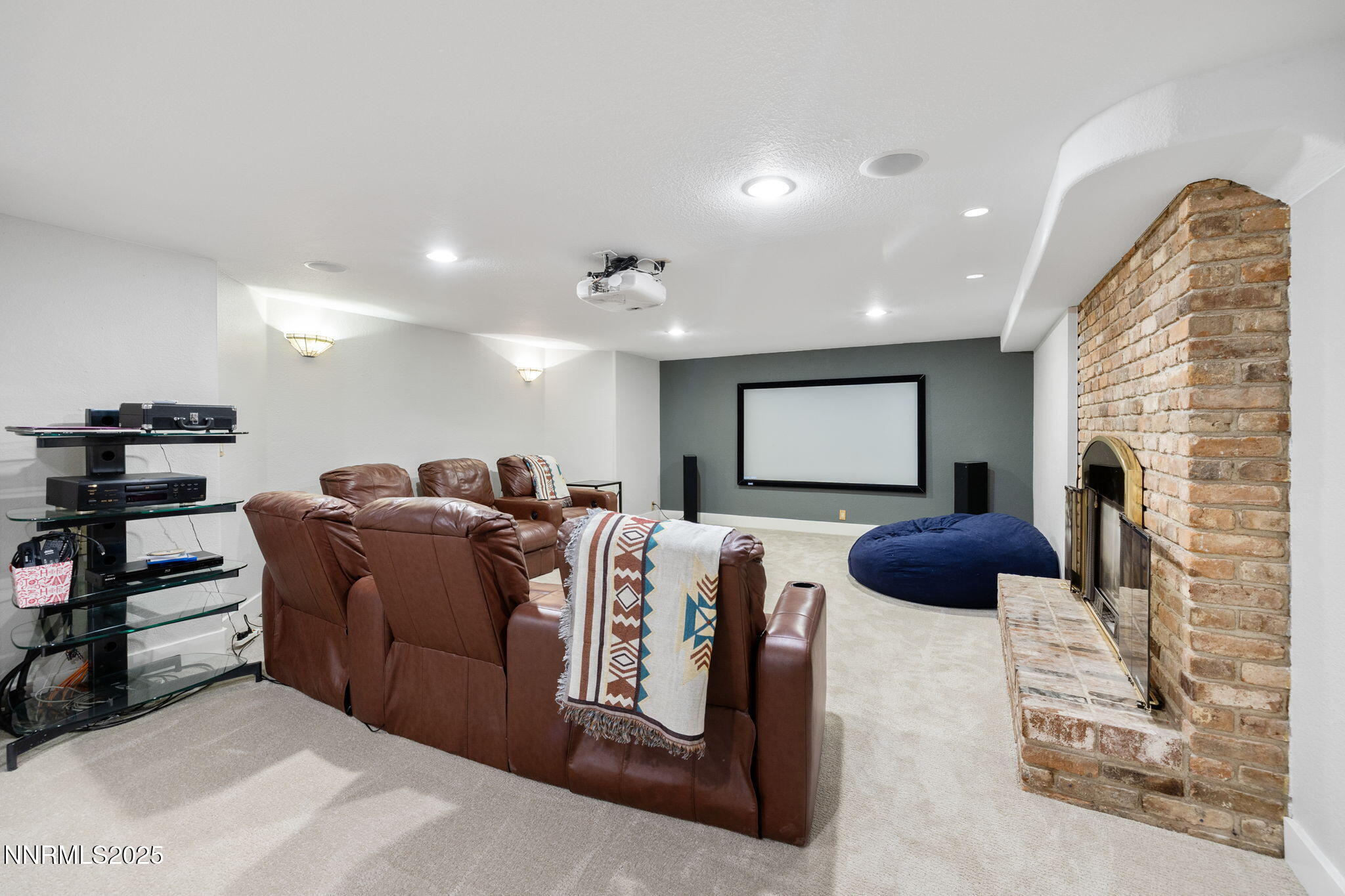 1855 Sierra Sage Lane Reno, NV 89509 - Photo 23 of 34 a living room with furniture and a flat screen tv