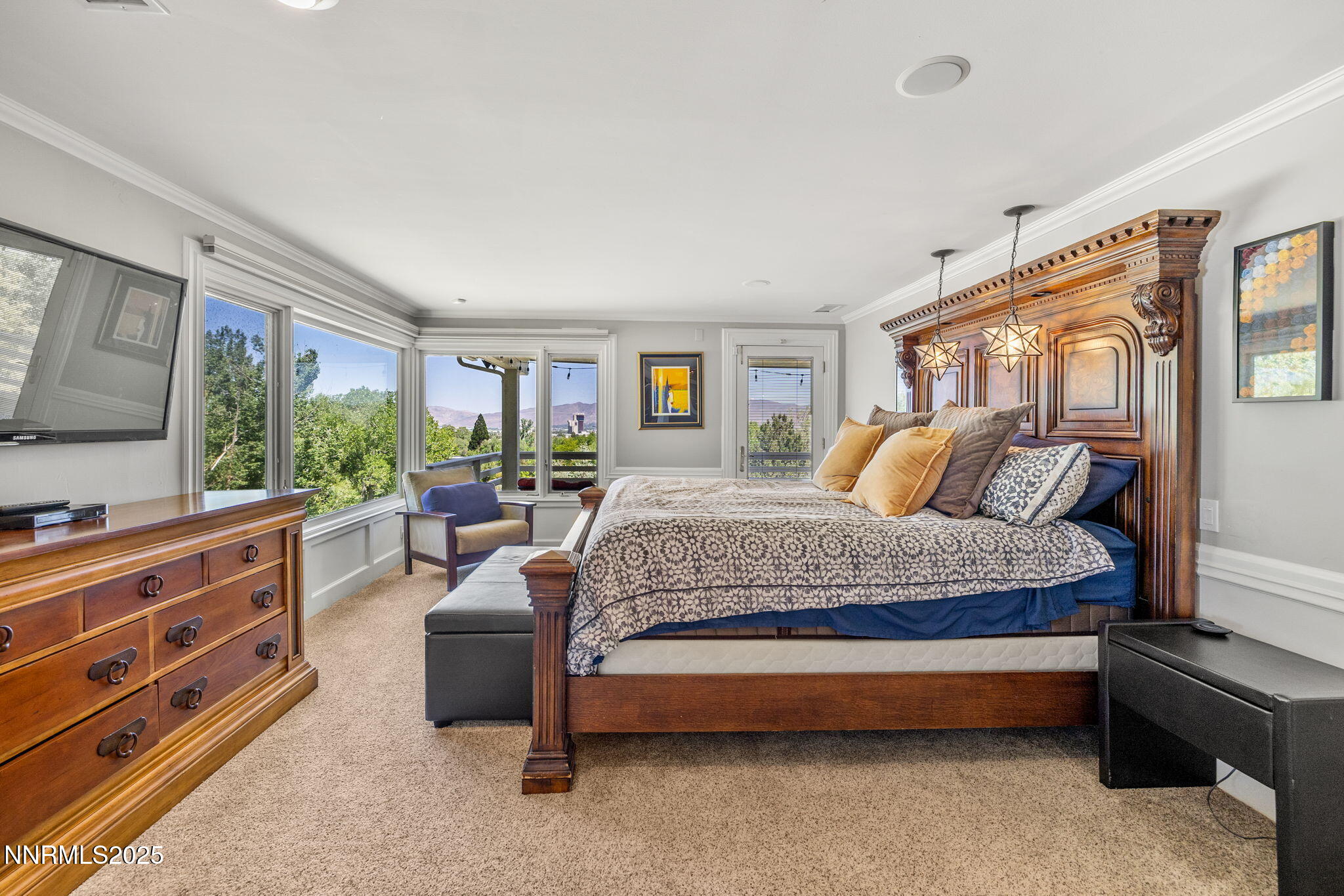 1855 Sierra Sage Lane Reno, NV 89509 - Photo 27 of 34 a spacious bedroom with a bed and a dresser