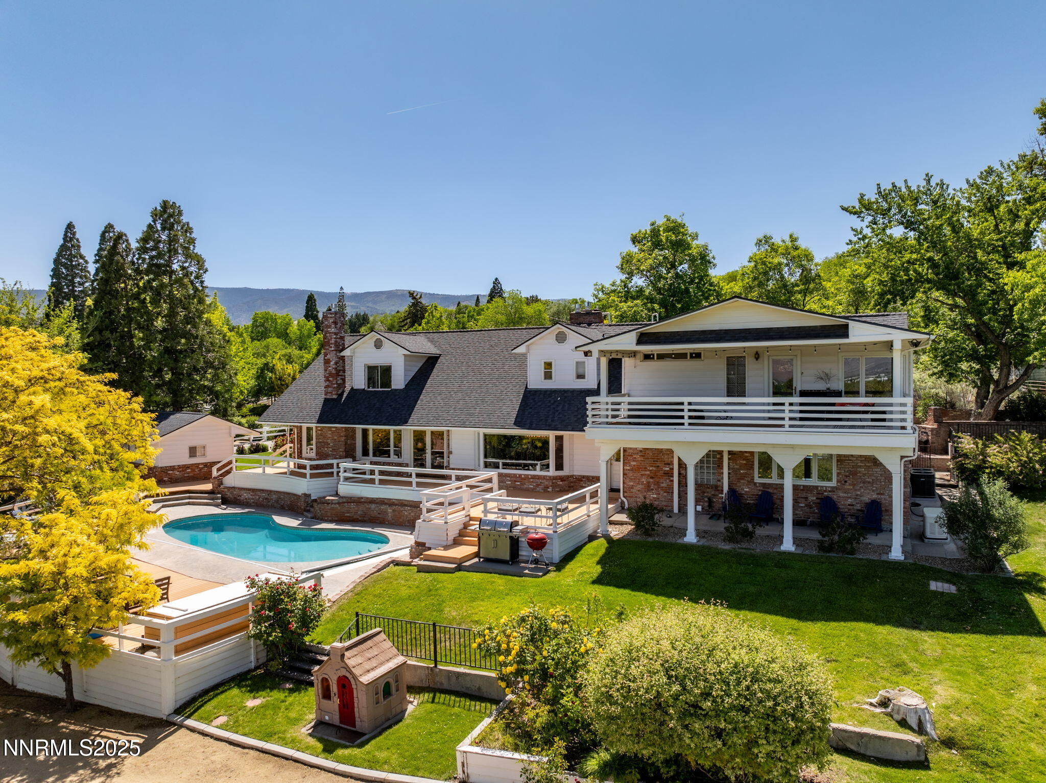 1855 Sierra Sage Lane Reno, NV 89509 - Photo 3 of 34 a front view of house with yard and outdoor seating