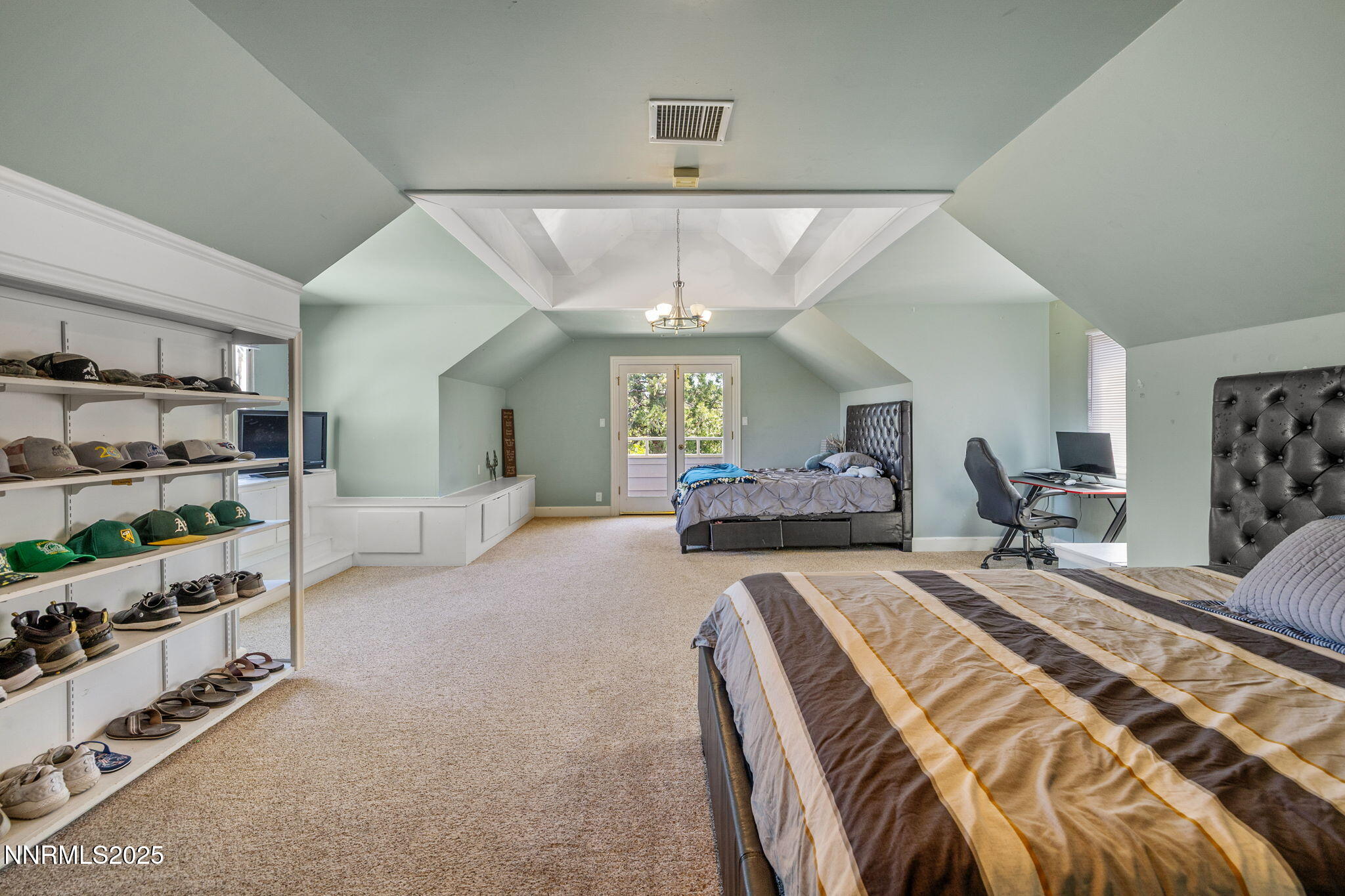 1855 Sierra Sage Lane Reno, NV 89509 - Photo 33 of 34 a bedroom with bed and a large window