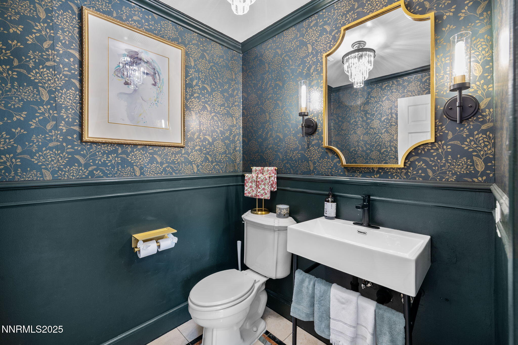 1855 Sierra Sage Lane Reno, NV 89509 - Photo 10 of 34 a bathroom with a sink and a mirror