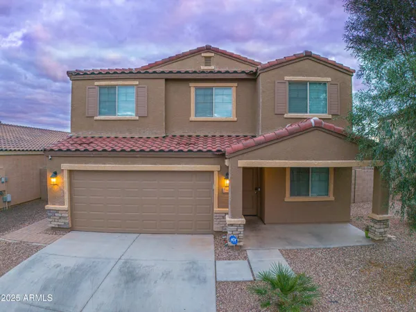 front view of a house with a garage