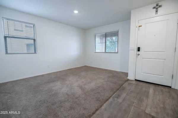 an empty room with windows