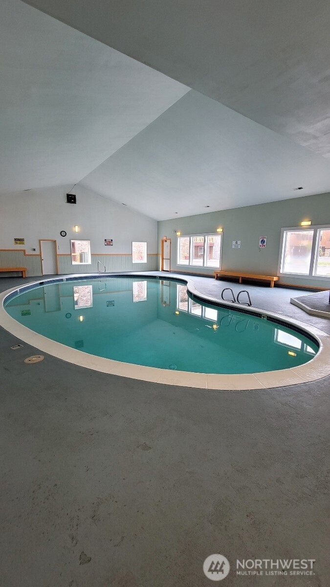 304 14th Street Northwest, Unit 115 Long Beach, WA 98631 - Photo 9 of 10 a view of outdoor space with swimming pool