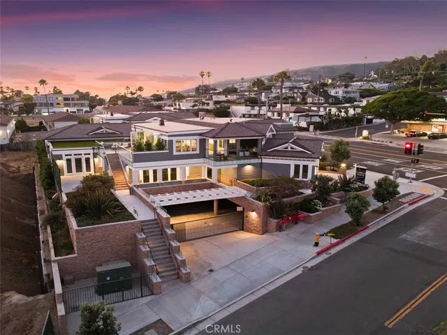 an aerial view of residential houses and city street